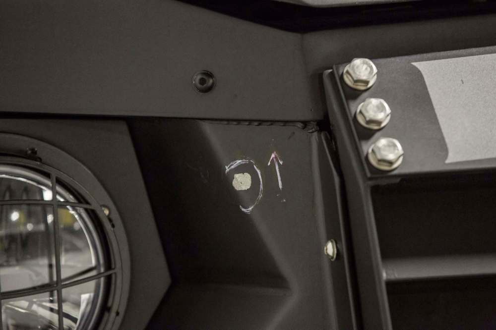 MIKE DEAL / WINNIPEG FREE PRESS
Chipped paint was the only damage to the ARV1, while a cruiser was riddled with bullets.