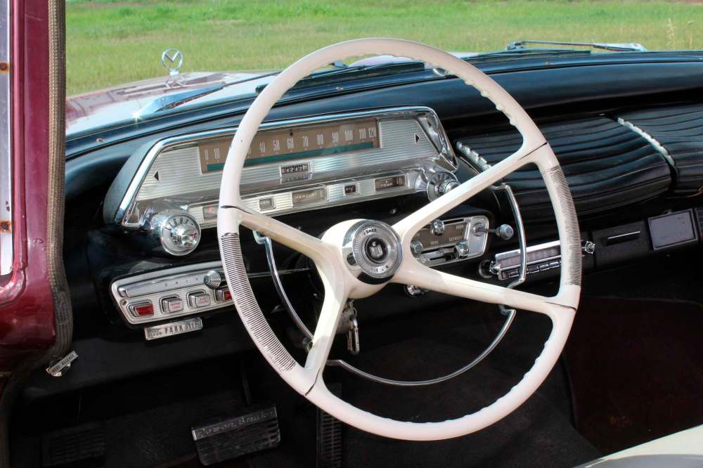 The 1958 Mercury Monterey features an electric clock, Deluxe AM radio and power steering.
