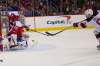 Washington Capitals goaltender Braden Holtby blocks a shot by New Jersey Devils left wing Taylor Hall Friday/ (Alex Brandon / The Associated Press)
