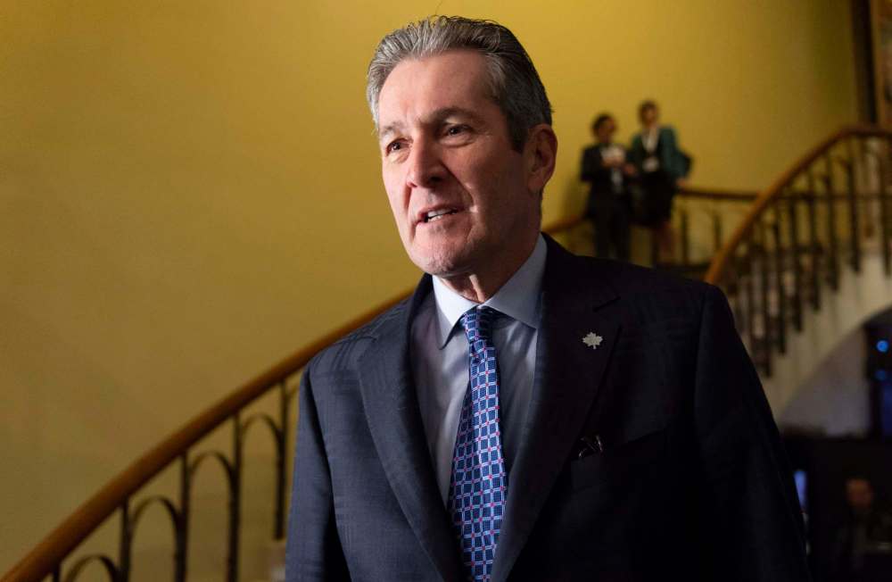 Manitoba Premier Brian Pallister arrives at the first ministers' meeting in Montreal on Friday. (Paul Chiasson / The Canadian Press)