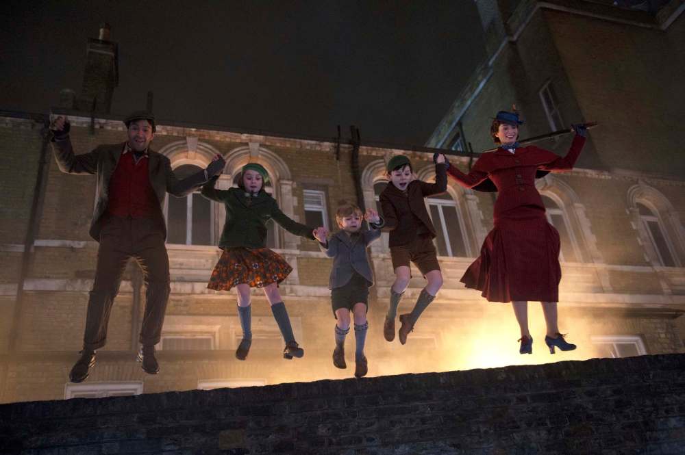 Jack (Lin-Manuel Miranda, from left), Annabel (Pixie Davies), Georgie (Joel Dawson), John (Nathanael Saleh) and Mary Poppins (Emily Blunt) take audiences on a new adventure 54 years after Marry Poppins first opened her umbrella. (Disney)