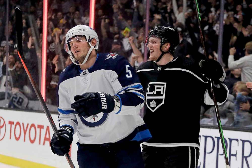 (AP Photo/Chris Carlson)
Los Angeles Kings left wing Austin Wagner, right, celebrates after scoring as Winnipeg Jets defenceman Dmitry Kulikov reacts during the second period in Los Angeles, Tuesday.