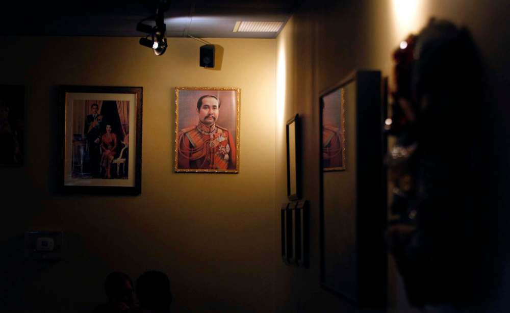 Thai royal family portraits adorn the walls at Siam Thai.