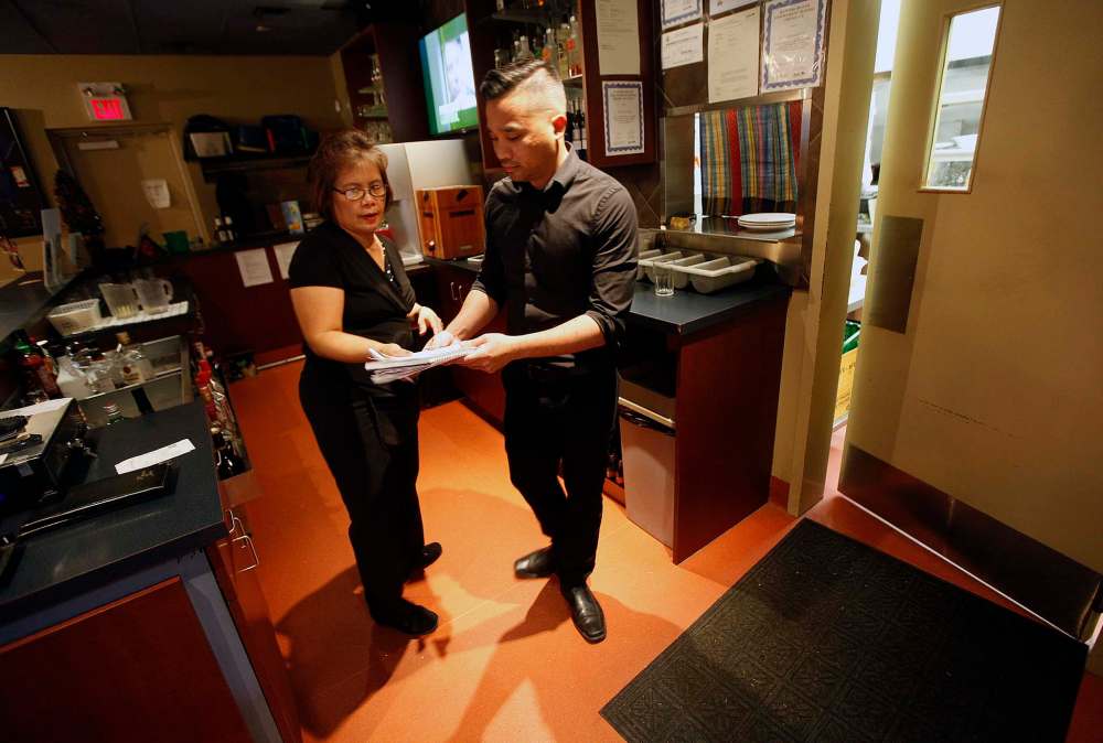 Mick Konmanisvong and waitress Connie Milanese