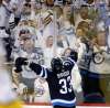 TREVOR HAGAN / THE CANADIAN PRESS FILES
Fans celebrate after Dustin Byfuglien scored against the Nashville Predators in the second round of the playoffs May 1.