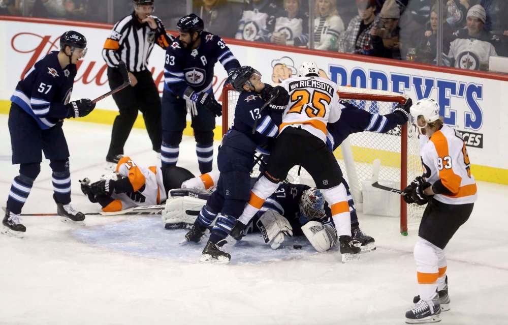 Jets coach Paul Maurice has noticed contact between players and goalies on the rise as the lines get blurred about what constitutes interference. (Trevor Hagan / The Canadian Press files)