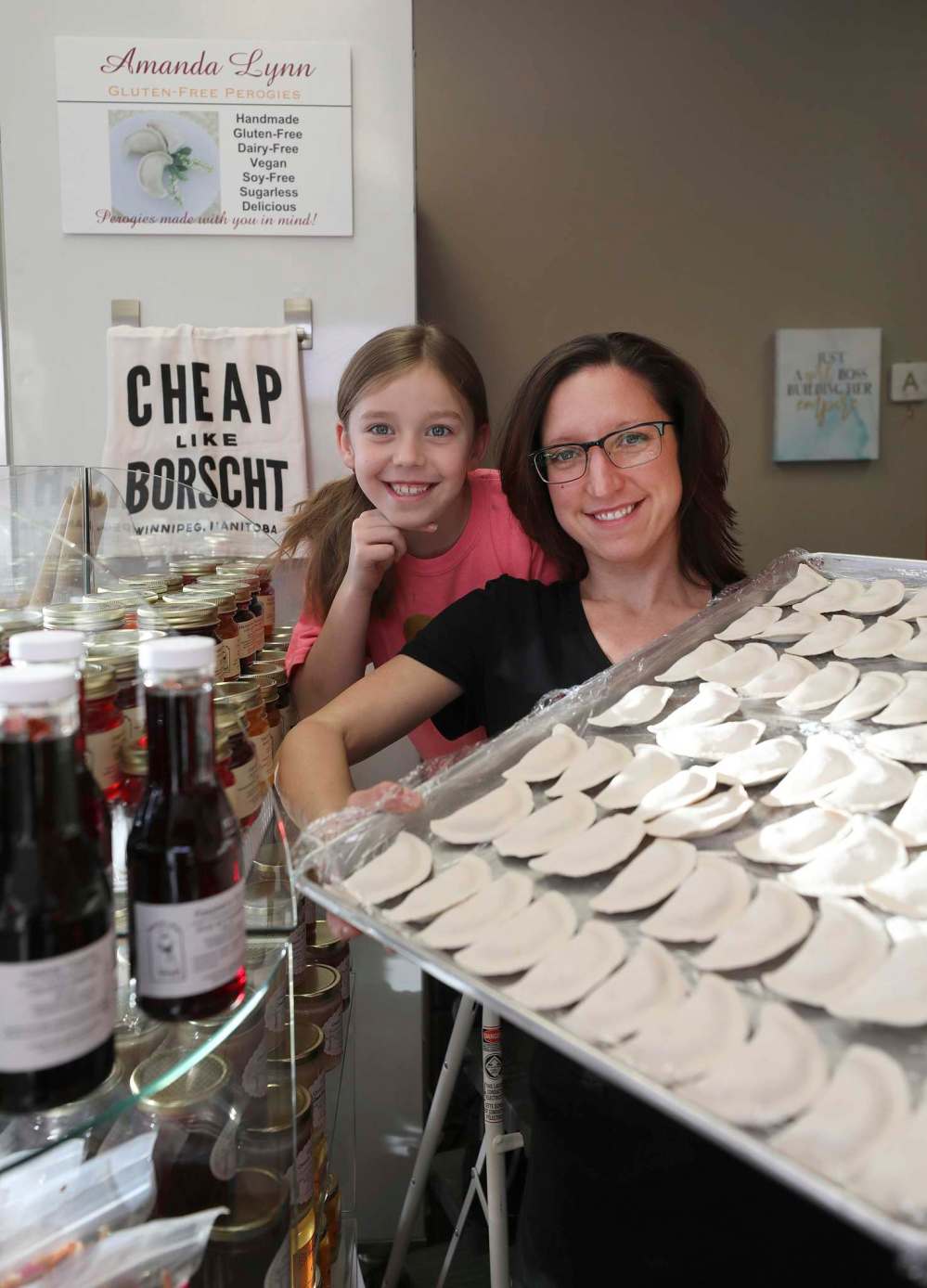 Amanda DeSutter, owner of Amanda Lynn Gluten Free Perogies, with daughter Chelsea, 7. ‘When people began liking my stuff and asking what my secret ingredient was, I said it was love.’