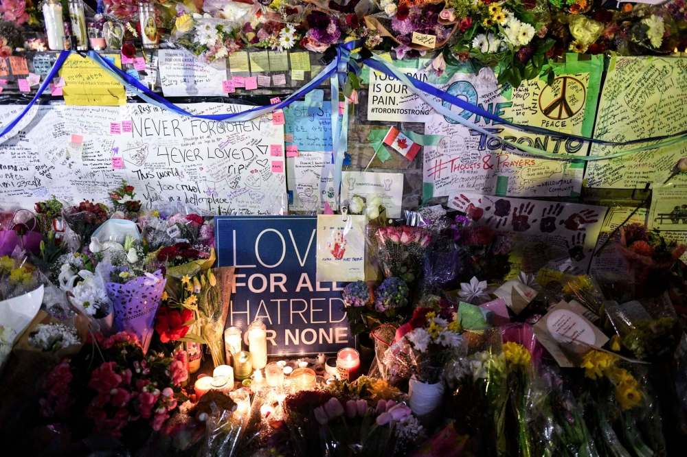 Galit Rodan / The Canadian Press files
In Toronto, the city mourned those killed and injured after a van plowed into pedestrians on Younge Street.