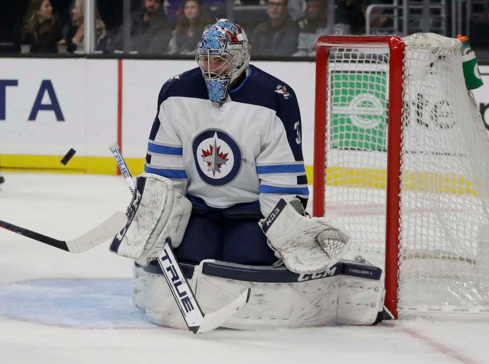 Connor Hellebuyck gets the start in net for Winnipeg tonight, while the rest of the lineup remains the same from the one that beat Edmonton on New Year's Eve. (Chris Carlson / The Associated Press files)