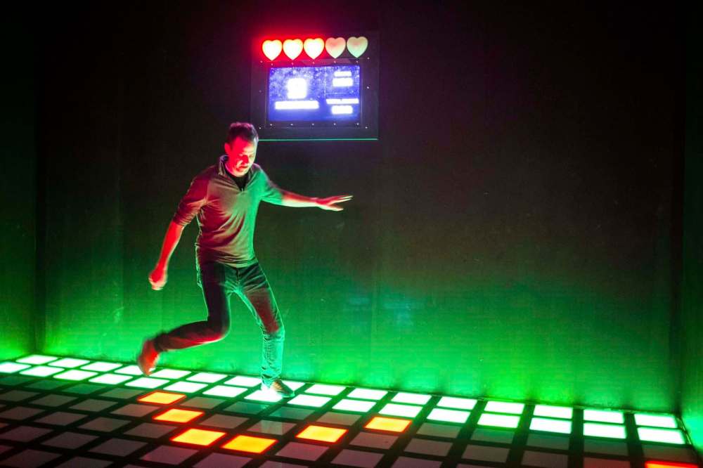Jumping on specific coloured squares isn't always as easy as it sounds. (Mikaela MacKenzie / Winnipeg Free Press)