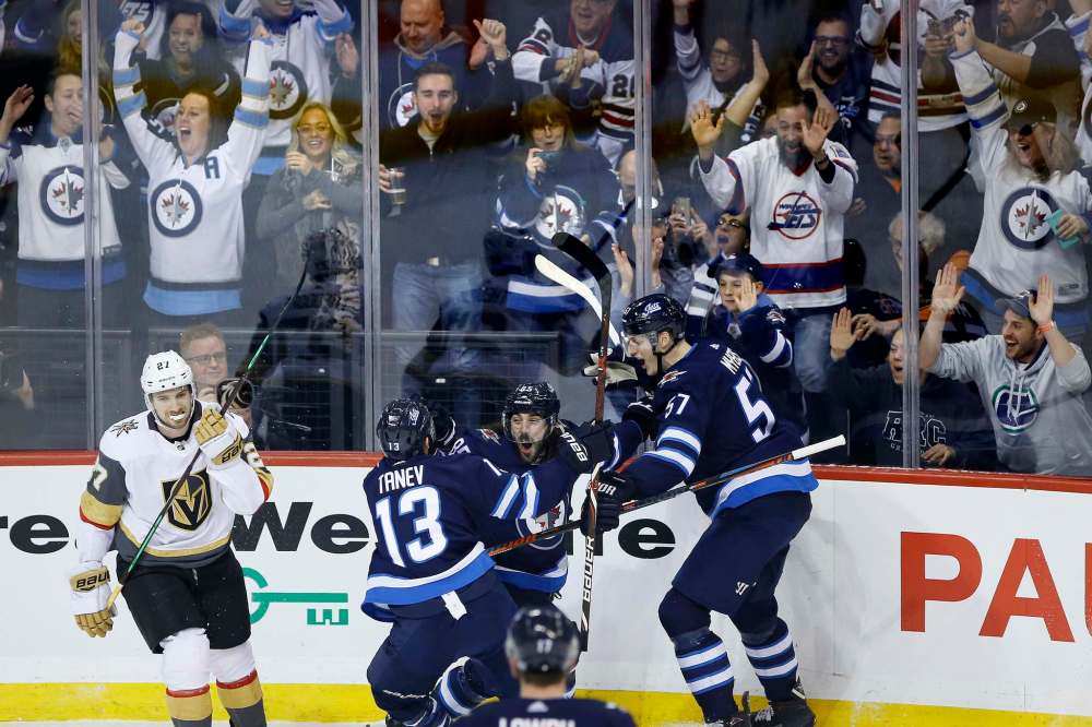 JOHN WOODS / WINNIPEG FREE PRESS
Winnipeg Jets' Mathieu Perreault (85) celebrates his goal against the Vegas Golden Knights with Brandon Tanev (13) and Tyler Myers (57) during second period NHL action in Winnipeg on Tuesday, January 15, 2019.