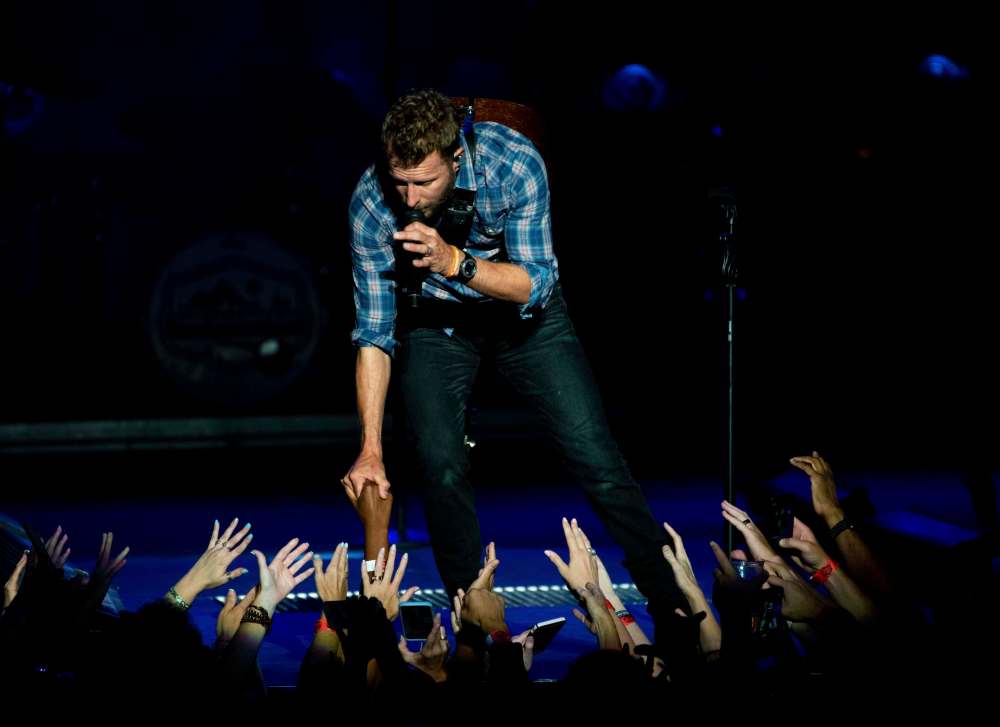 Dierks Bentley performs on stage at Verizon Wireless Amphitheatre on Saturday, Aug. 11, 2018, in Alpharetta, Ga. (Photo by Paul R. Giunta/Invision/AP)