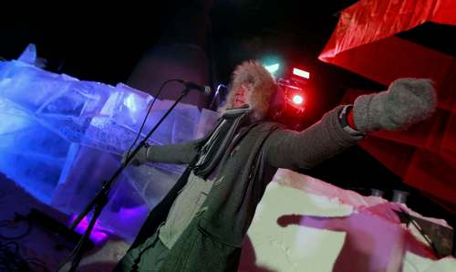 Norwegian artist Terje Isungset warms up the audience with jumping jacks before he performs on instruments made of ice at Glacial Time.