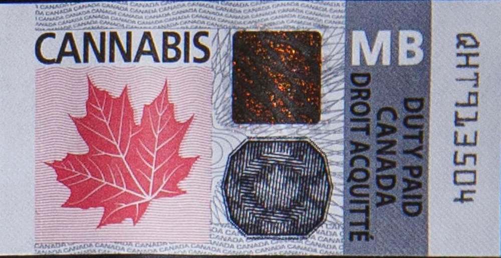 MIKE DEAL / WINNIPEG FREE PRESS
Packages of cannabis purchased on the first day that cannabis can be sold legally in Canada.- cannabis excise tax stamp
181017 - Wednesday, October 17, 2018.