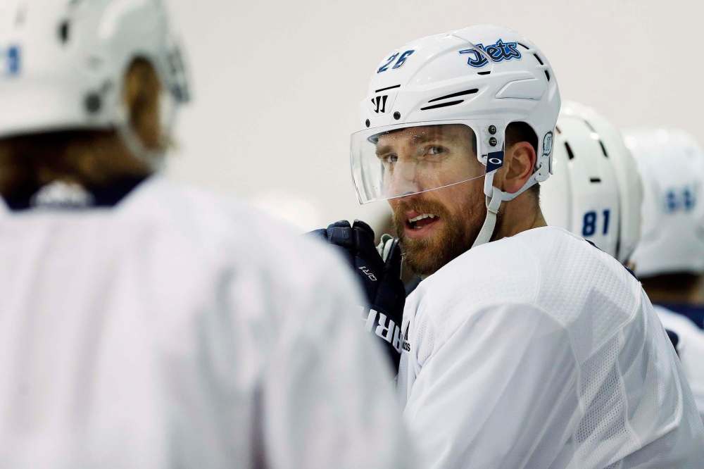 John Woods / THE CANADIAN PRESS FILES
Winnipeg Jets captain Blake Wheeler tried to absorb some of the pressure on slumping teammate Patrik Laine.