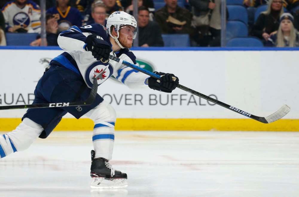 Jeffrey T. Barnes / The Associated Press
Winnipeg Jets forward Andrew Copp (9) shoots during the second period.