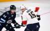 Josh Morrissey defends against Florida Panthers' Aleksander Barkov in Helsinki. (Martti Kainulainen / Lehtikuva Files)