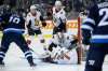 Winnipeg Jets' Bryan Little (18) looks on as Ottawa Senators goaltender Anders Nilsson (31) and Brady Tkachuk (7) smother his shot during second period NHL action in Winnipeg on Saturday, February 16, 2019. THE CANADIAN PRESS/John Woods