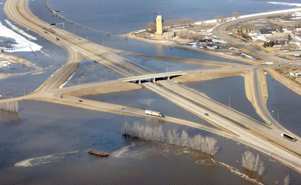 (John Stennes photo)
Flood waters surrounding the I-29 interchange at Pembina, N.D., in 2009. A U.S. report says that several factors will determine the seriousness of flooding this spring, including future snowfall, the rate and timing of the snow melt, whether there is heavy rain or snow on still-frozen ground this spring and river ice jams.