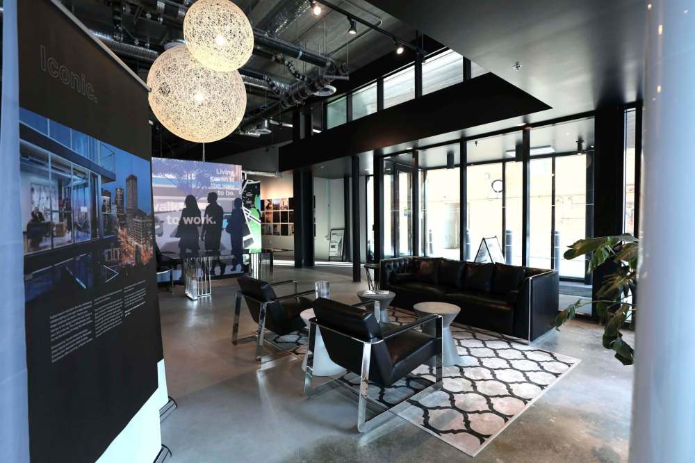 PHOTOS BY RUTH BONNEVILLE / WINNIPEG FREE PRESS
The main floor commercial business suite in the Glasshouse condo complex features walls of floor-to-ceiling windows.