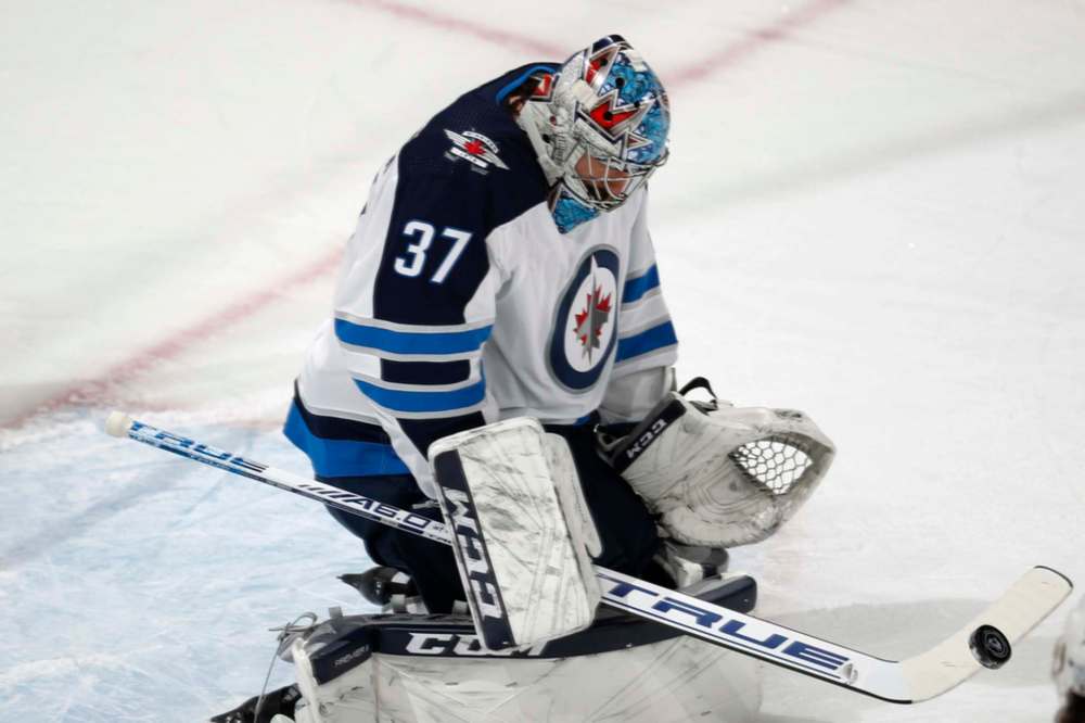 Connor Hellebuyck is expected to start tonight, but coach Paul Maurice wasn't confirming anything Sunday. (David Zalubowski / The Associated Press files)