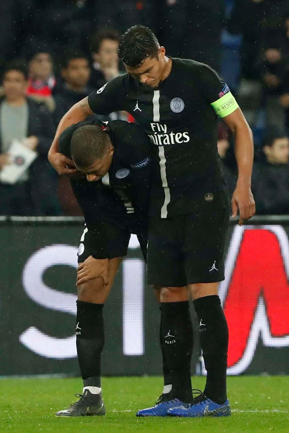 Thibault Camus / The Associated Press
PSG defender Thiago Silva, right, and PSG forward Kylian Mbappe at end of the Champions League round of 16, 2nd leg, soccer match between Paris Saint Germain and Manchester United at the Parc des Princes stadium in Paris, France, Wednesday.