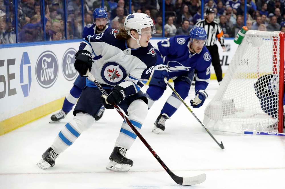 Chris O’Meara / The Associated Press files
Winnipeg Jets defenceman Sami Niku earned his promotion to the Jets and now has earned the big club’s trust as his playing time increases.