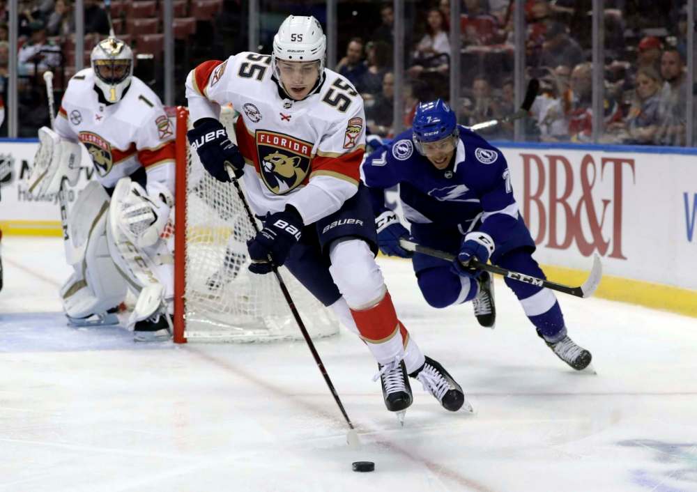 LYNNE SLADKY / THE ASSOCIATED PRESS FILES
Bogdan Kiselevich is chased by Tampa Bay’s Mathieu Joseph in a game on Sept. 29, 2018. He was traded from Florida to Winnipeg on Feb. 25.