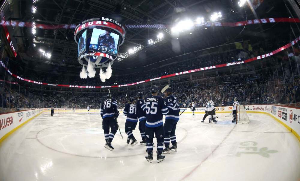 The Winnipeg Jets and San Jose Sharks lit the lamp nine times Tuesday, but such isn't necessarily a recipe for success for a Jets team missing three of its top defencemen.
TREVOR HAGAN / THE CANADIAN PRESS