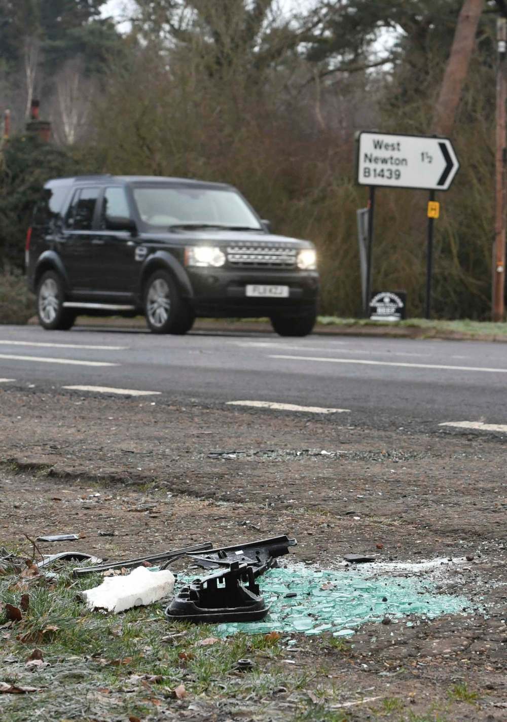 John Stillwell/PA via The Associated Press
Broken glass and car parts on the road side near the Sandringham Estate, England, where Prince Philip was involved in an accident in January.