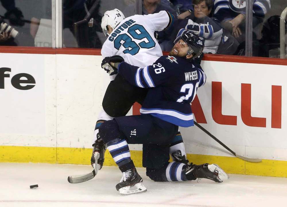 Wheeler took an inadvertent elbow to the face from forward Logan Couture midway through the final period. (Trevor Hagan / Free Press files)
