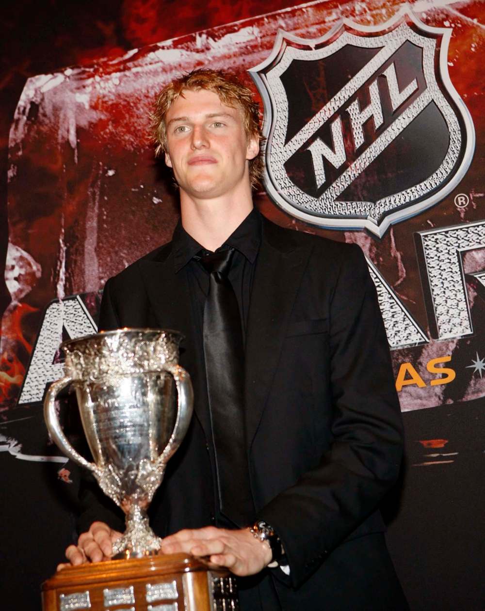 Myers poses with the Calder Memorial Trophy in 2010. (Isaac Brekken / Associated Press files)
