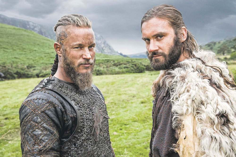 Jonathan Hession / History
Travis Fimmel (left) and Clive Standen star as brothers Ragnar and Rollo in the History Channel show Vikings.