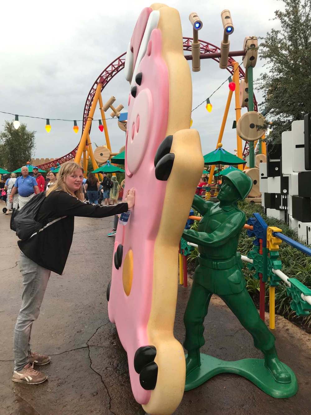 The writer’s daughter, Hannah Pemberton has fun interacting with one of the many oversized toy pieces that are dotted throughout Toy Story Land.