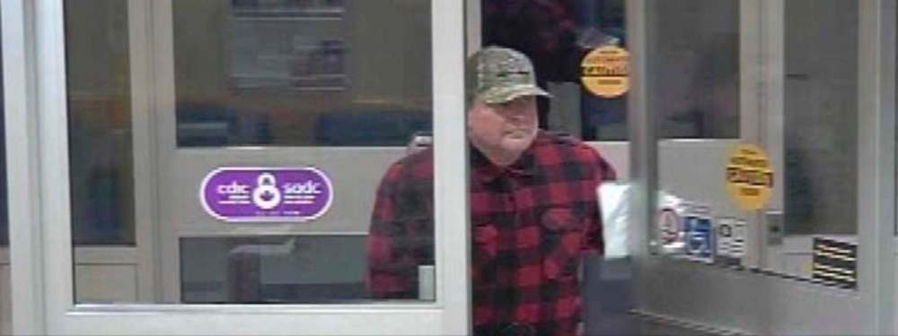 A suspect — later identified as Steve Vogelsang — is shown in a screengrab from video from the Medicine Hat Police Service Facebook page. (Medicine Hat Police Service)