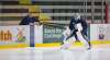 (MIKE DEAL / WINNIPEG FREE PRESS) Winnipeg Jets goaltender Connor Hellebuyck works with goaltending coach Wade Flaherty at Monday's practice. Hellebuyck says last year's playoff experience will be valuable heading into Wednesday's Game 1 against the St. Louis Blues.