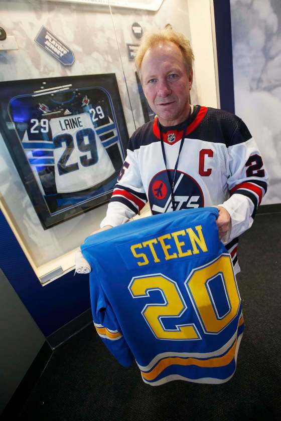 JOHN WOODS / WINNIPEG FREE PRESSFormer Winnipeg Jets star Thomas Steen clutches a St. Louis Blues jersey bearing his son Alex’s number Tuesday.
