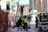 RUTH BONNEVILLE / WINNIPEG FREE PRESS
Crews set up for the whiteout party along Hargrave Street on Wednesday.