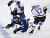 THE CANADIAN PRESS/John Woods
Winnipeg Jets' Bryan Little gets tripped up by St. Louis Blues' Jaden Schwartz during the third period of the Jets' 2-1 playoff loss to the Blues on Wednesday.