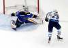 Patrik Laine scores his third goal of the playoffs against the Blues netminder Jordan Binnington in the second-period. The tally gave the Jets a 2-1 lead and they never looked back. JEFF ROBERSON / THE ASSOCIATED PRESS