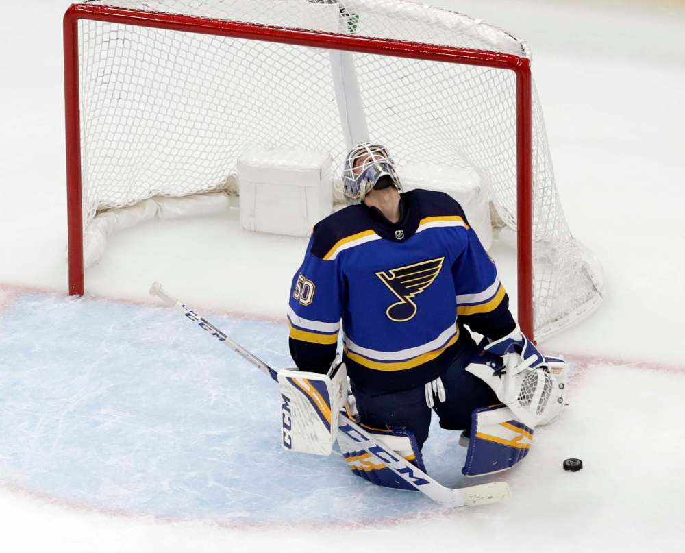 Jordan Binnington was beat six times on 29 shots by Winnipeg on Sunday. (Jeff Roberson / The Associated Press)
