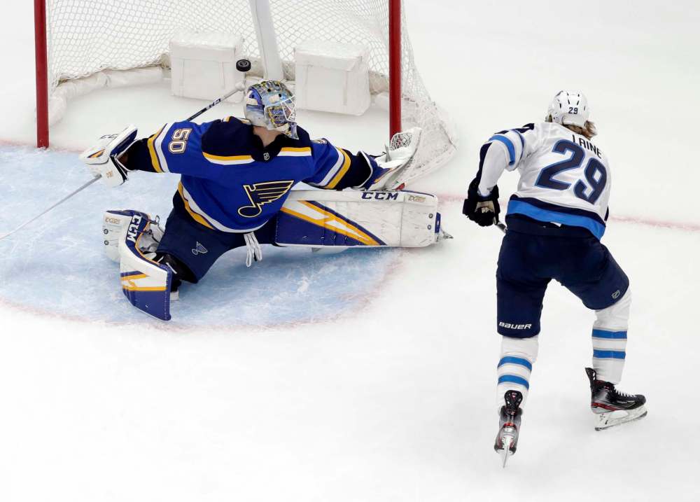 Patrik Laine has scored on Jordan Binnington in each of the three games of the series. (Jeff Roberson / The Associated Press)