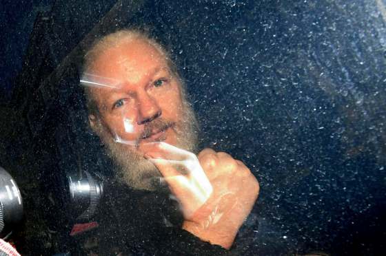 Victoria Jones / The Press Association filesJulian Assange gestures as he arrives at Westminster Magistrates’ Court in London, after the WikiLeaks founder was arrested by Metropolitan Police on April 11.