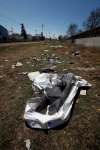 Trash litters the area near the CP train tracks just north of Notre Dame Avenue at Valour Road. (Phil Hossack / Winnipeg Free Press)