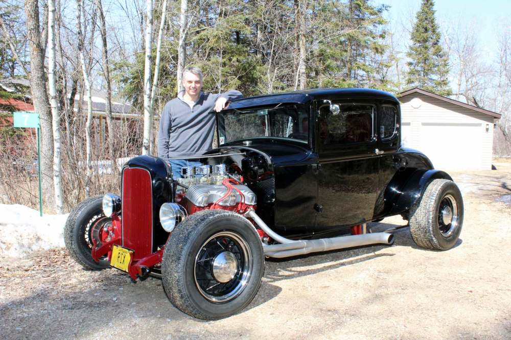 Larry D’Argis / Winnipeg Free Press
Dave Cushnie beams next to his classic Ford, which will join more than 100 other local hot rods, customs and classic at the Manitoba Street Rod Association’s 20th annual Rodarama car show running today through Sunday at East End Arena.