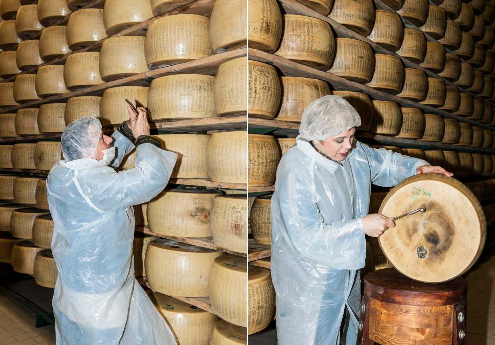 Emanuele Amighetti / for the Washington Post
Ilaria Bertinelli (right) demonstrates how the integrity of each wheel of Parmigiano Reggiano is verified tt the Bertinelli factory in Parma, Italy.