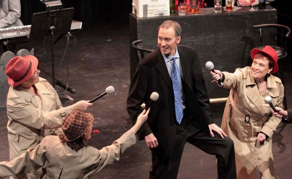 Jeff Derksen photo
BS Comedy Players artistic director Mitch Krohn (centre) plays Brian Pallister in a 2016 show.