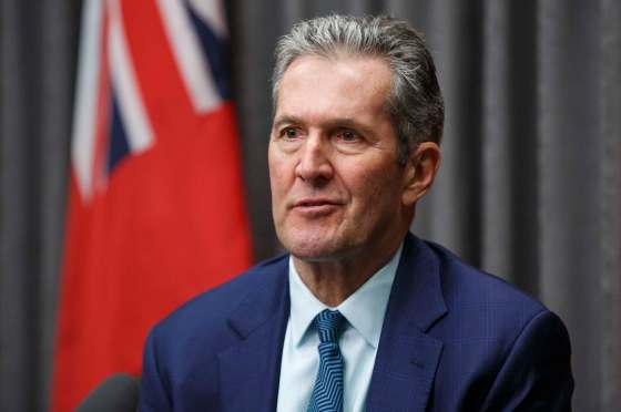 MIKE DEAL / WINNIPEG FREE PRESS Premier Brian Pallister responds to the news that the federal cabinet announced it has delayed approval of the construction of the Manitoba-Minnesota transmission project by a month.