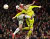 Sergei Grits / The Associated Press files
Henrikh Mkhitaryan (left) won&rsquo;t join Arsenal for its Europa League game in Baku due to simmering unrest in Azerbaijan.