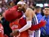Frank Gunn / THE CANADIAN PRESS FILES
Ryan Bonne (left), better known as the Raptor, hugs Vince Carter during a game.